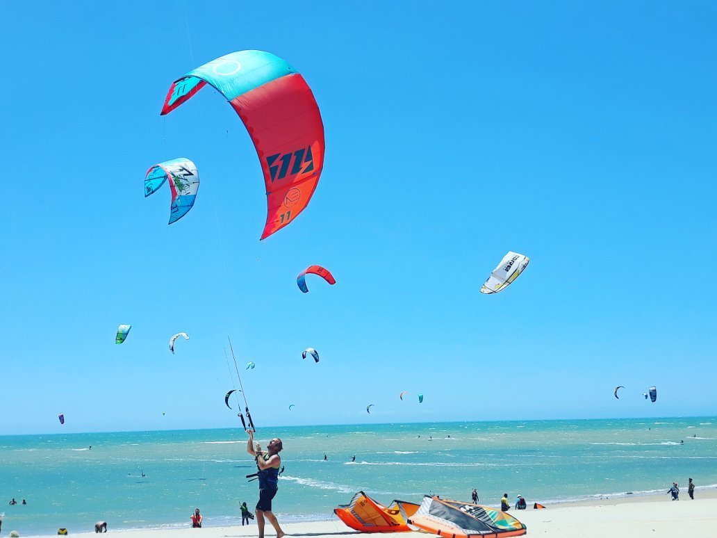 Kiteboarders riding at Praia de Cumbuco in Brazil // kiterrcom