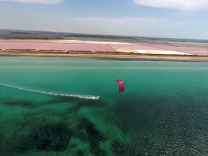 Kiteboarding along the salt pans in Lo Stagnone, Marsala | The best kitespots in Sicily - Kiterr.com