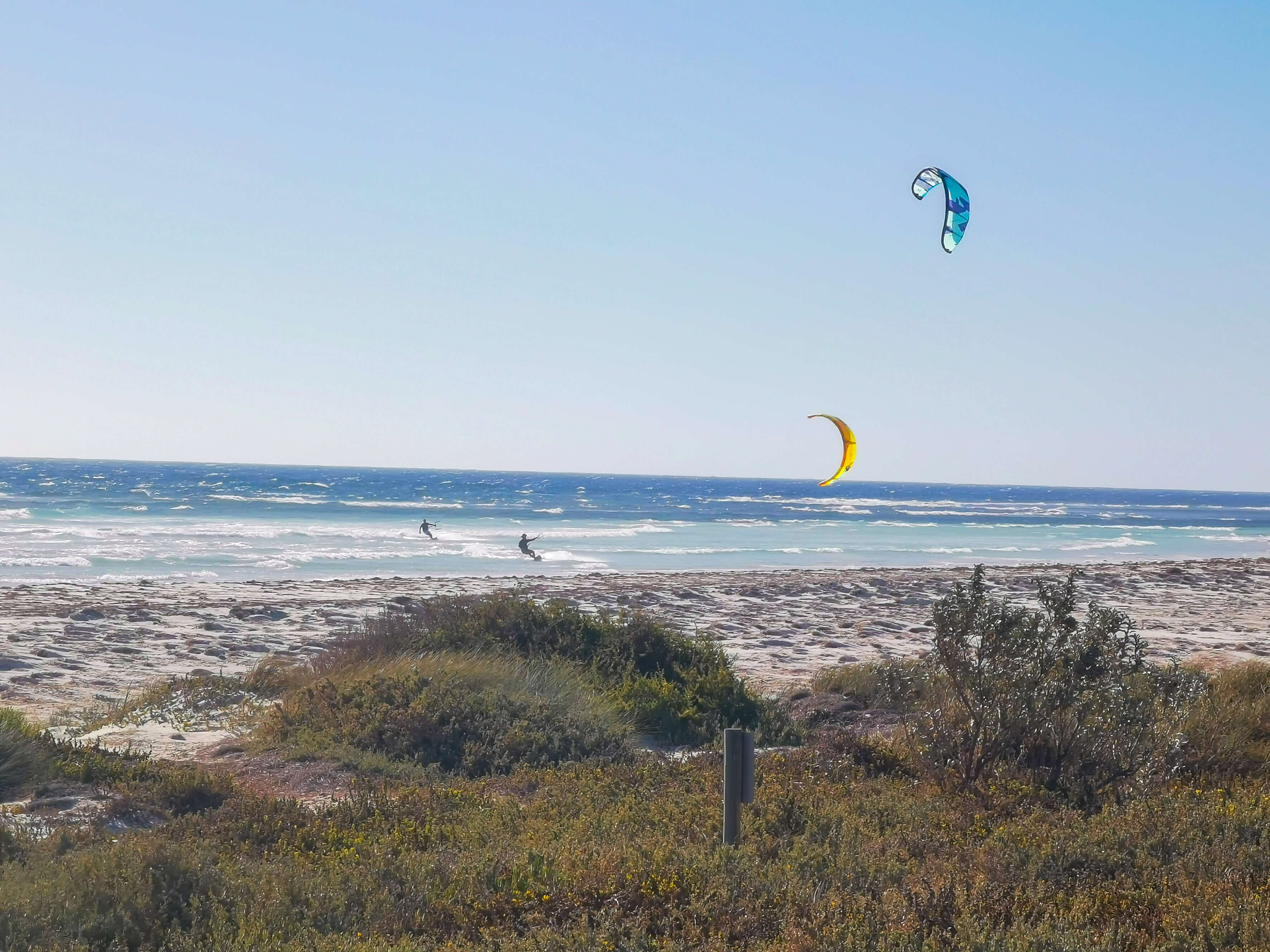 Kiteboarders riding at South Beach in Port Denison near Dongara, Western Australia // Kiterrcom