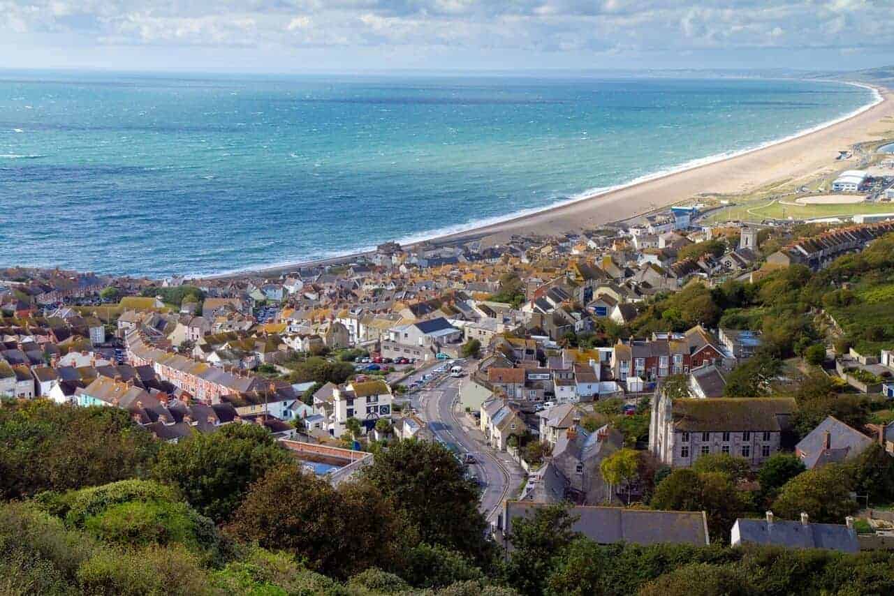 A view of Fortuneswell village and Chesil Beach, Weymouth, Dorset // Kiterr.com